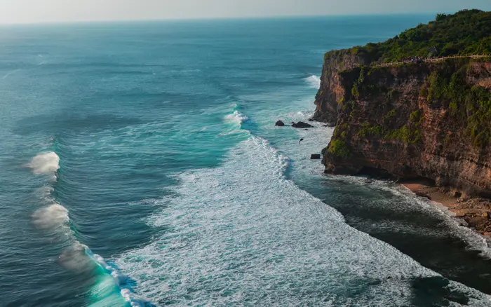 The Uluwatu sea cliffs with waves breaking below
