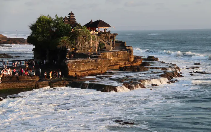 Tanah Lot temple on its rock at sunset